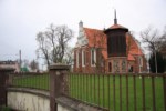 Kościół farny z drewnianą dzwonnicą